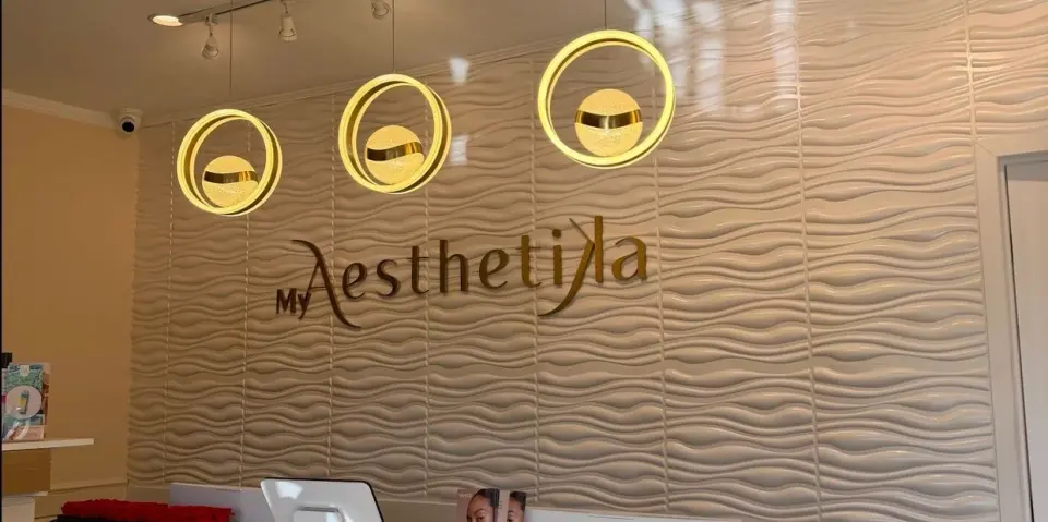 MyAesthetika reception wall and signage pictured on its About page